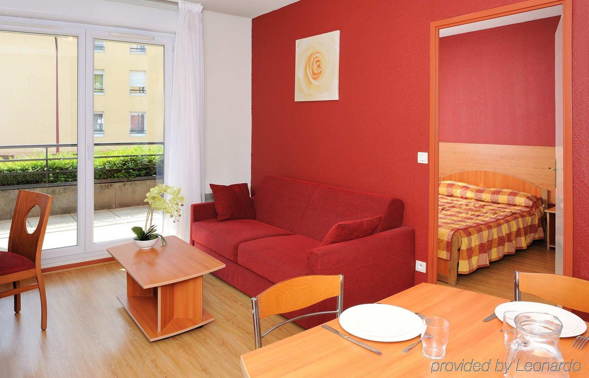 Aparthotel Sejours & Affaires Geneve Saint Genis Zimmer foto